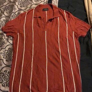Men’s Zara brown and white striped polo shirt.